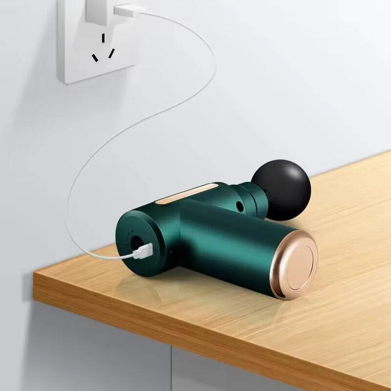 Mini massage gun with button and 4 heads